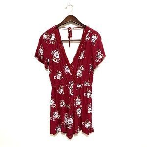 Floral Romper with eyelet neckline size medium